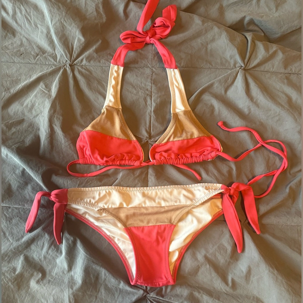 Kibys Coral, Gold & Cream Bikini with ties. New: $170
Size: Small